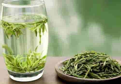 White tea in a clear cup Image