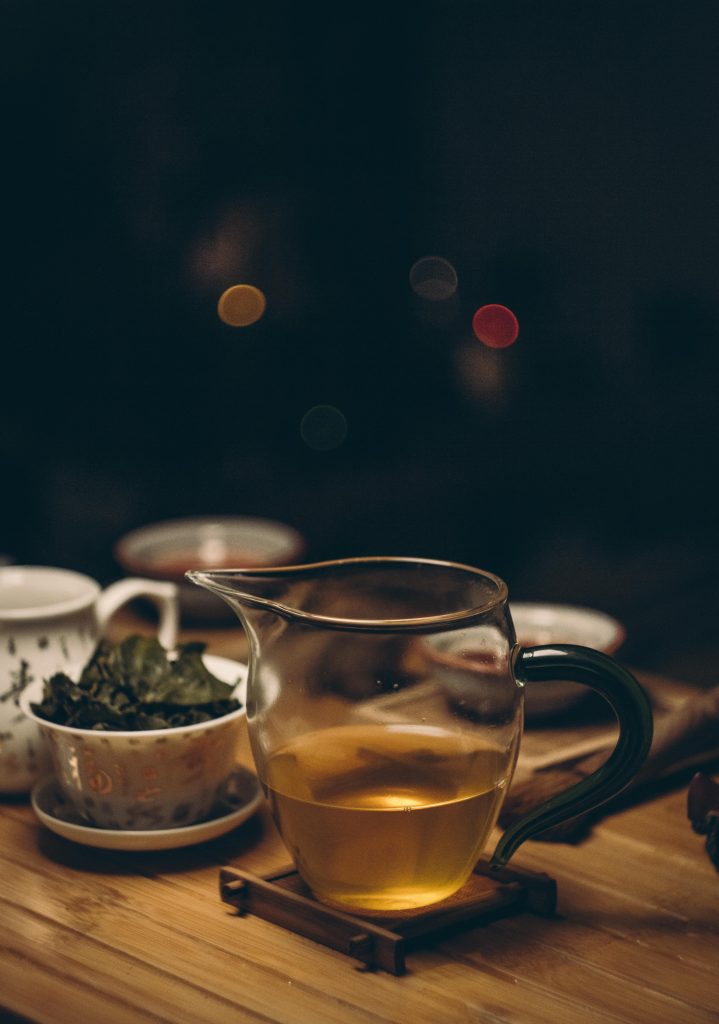 Clear Glass Cup on Brown Wooden Table Image